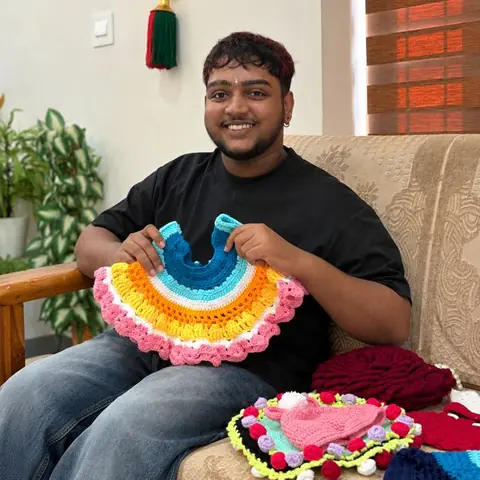 Student with a rainbow crochet frock