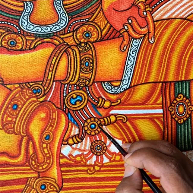 Detailing jewellery with a fine brush
