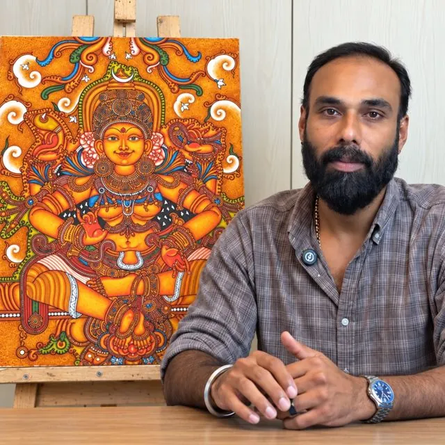 The finished Bhuvaneshwari mural painting on an easel