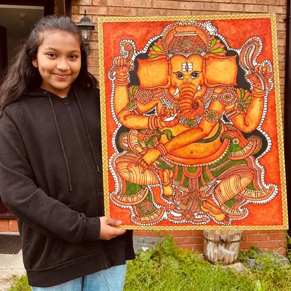 Arushi with her Ganesha mural